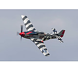 Image of iCanvas A P-51 Mustang Flies By At Willow Run, Michigan by Stocktrek Images - Canvas Print
