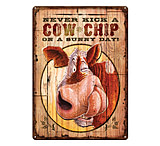 Image of River's Edge 12in x 17in Tin Sign - Never Kick A Cowchip