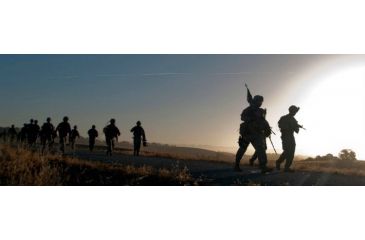 Image of Military ruck march with backpacks