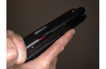 Image of Chamber check with an overhand grip on the slide. 