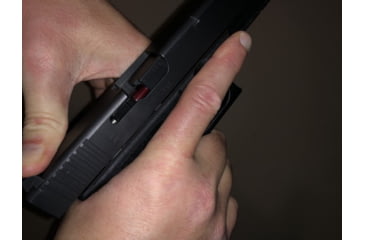 Image of Chamber check with a thumb push. 