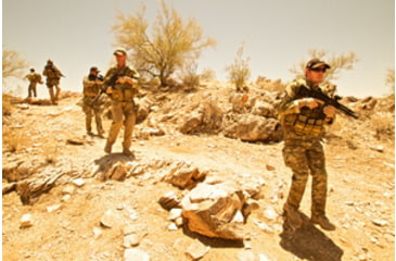Image of Squad of Operators Wearing Chest Rigs and Camo with Rifles