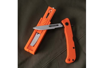 Image of Hogue Expel Blade Dispenser, 60 Size, Orange, 167679
