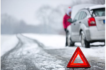 Image of Car stranded in snowstorm