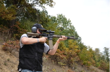 Image of Man Shooting AR15 Outside