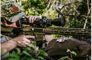 Image of Man Looking Through Rifle Scope on AR