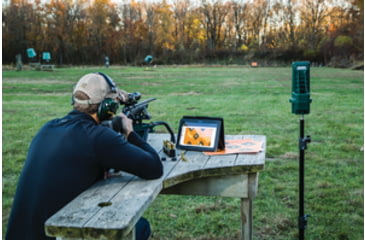 Image of Man Practicing Long-Range Shooting and Using a Target Camera