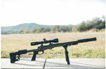 Image of Long Range Rifle with a Suppressor on a Shooting Bench