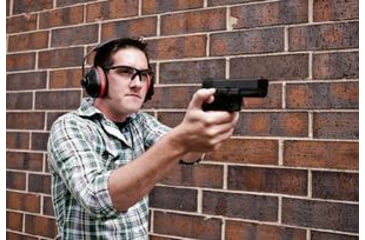 Image of Man Shooting a Pistol at a Target Range
