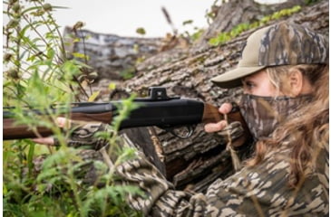 Image of Woman Hunting With a Shotgun and a Red Dot Sight