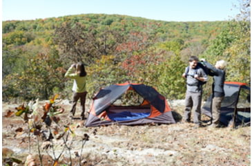 Image of 3 People on a Ridge with a Camping Tent
