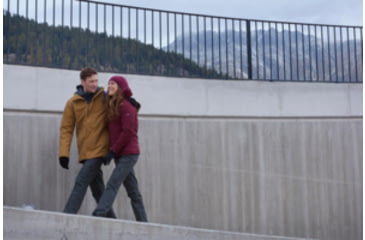 Image of Man and Woman Walking and Wearing Winter Jackets