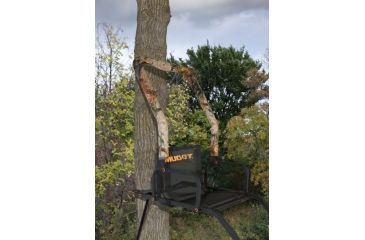 Image of Muddy Outlander Ladderstand, includes 1-1in Ratchet Strap, 2-1in Stabilizer Straps, Adjustable Support Bar, Full Body Arrest Harness, Padded, flip-back Shooting Rail, Black/Camo MLS1100