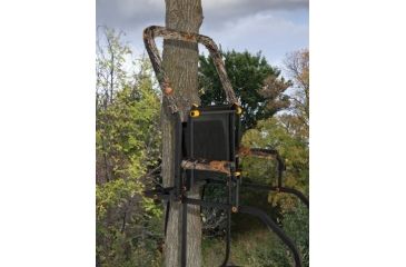 Image of Muddy Skybox Ladderstand, includes 1-1in Ratchet Strap, 2-1in Stabilizer Straps, Adjustable Support Bar, Full Body Arrest Harness, Adjustable Padded Shooting Rail that flips back., Black/Camo MLS1500