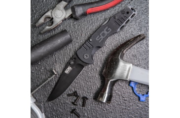 Image of SOG Specialty Knives &amp; Tools Salute Mini Folding Knife, 3.1in, 8Cr13MoV Blade, Clip Point, Black, G10 Handle, Black Oxide Finish, Black/Black, SOG-FF1101-CP