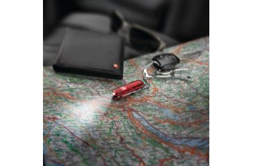 Image of Victorinox SwissLite Pocket Knife - Swiss Army Red Knife Swiss Army Ruby Knife, Colors Victorinox SwissLite Pocket Knife - White Light Swiss Army Knife Red