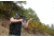 Man Shooting AR15 Outside