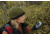 Woman Using GPS Device in the Woods