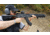 Man Shooting a Black AK47