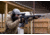 Ma Shooting AR 15 with ACOG Scope