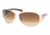 Prada PR64IS #5AK6S1 - Shiny Gold Frame, Brown Gradient Lenses