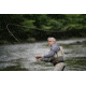 Fly Fisherman Fishing In River
