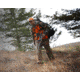 Man Hunting in Orange Vest with Rifle