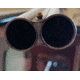 Double-barreled shotgun with fixed Cylinder chokes.