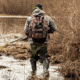 Waterfowl hunter in marshes.