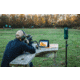 Man Practicing Long-Range Shooting and Using a Target Camera