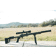 Long Range Rifle with a Suppressor on a Shooting Bench