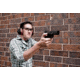 Man Shooting a Pistol at a Target Range