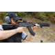 Man Shouldering Rifle and Aiming