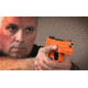 An expert marksman pointing a Laser Training Pistol by Laser Ammo.