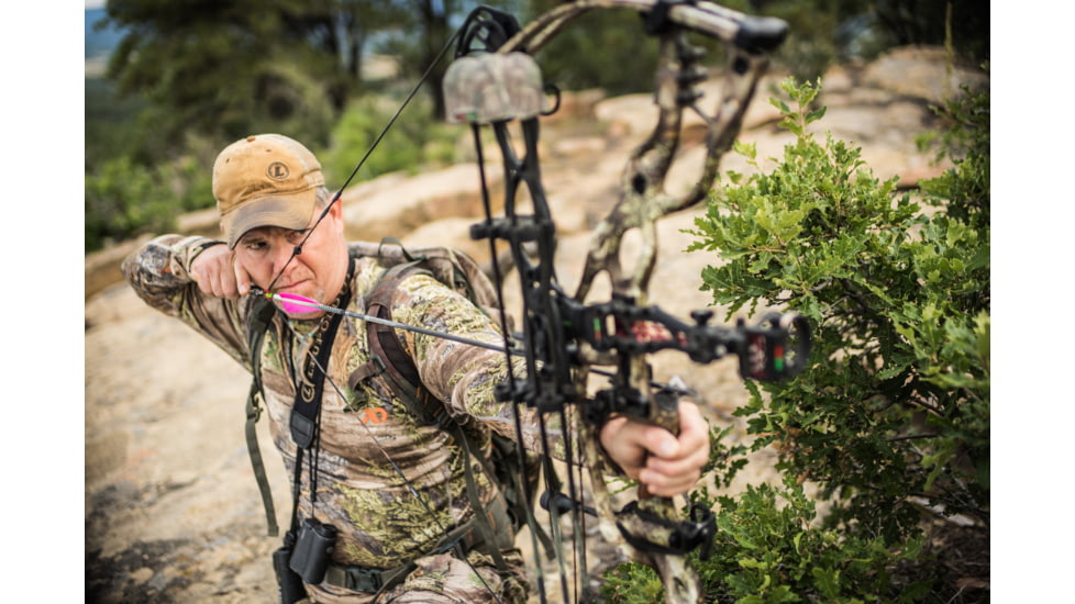 Bowhunter Taking Aim