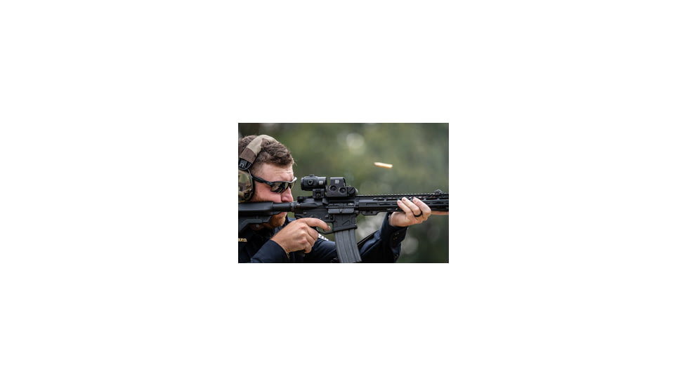 Man aiming through EOTech XPS2
