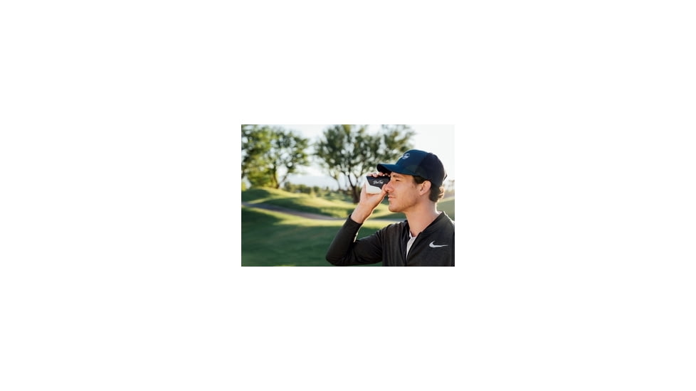 Man Using Golf Rangefinder on the Course