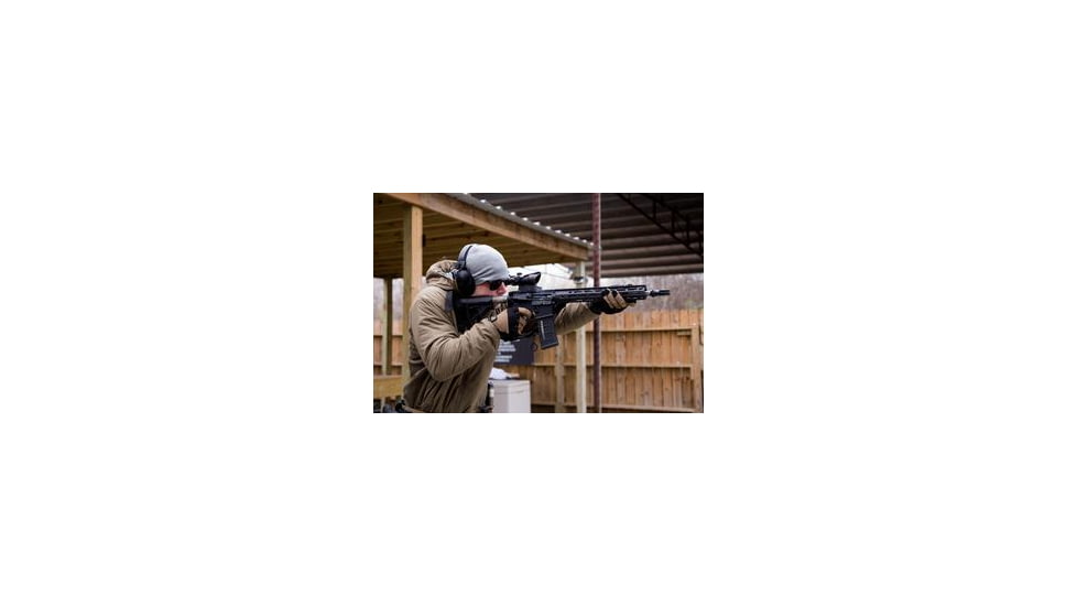 Ma Shooting AR 15 with ACOG Scope