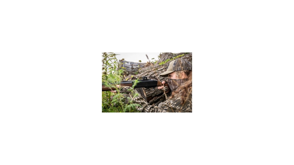 Woman Hunting With a Shotgun and a Red Dot Sight