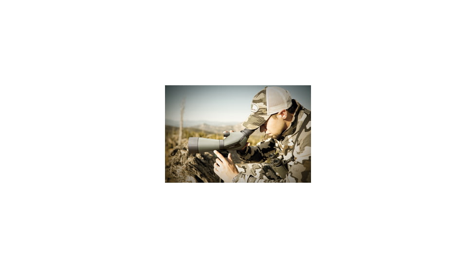 Man in Camo Using a Vortex Spotting Scope