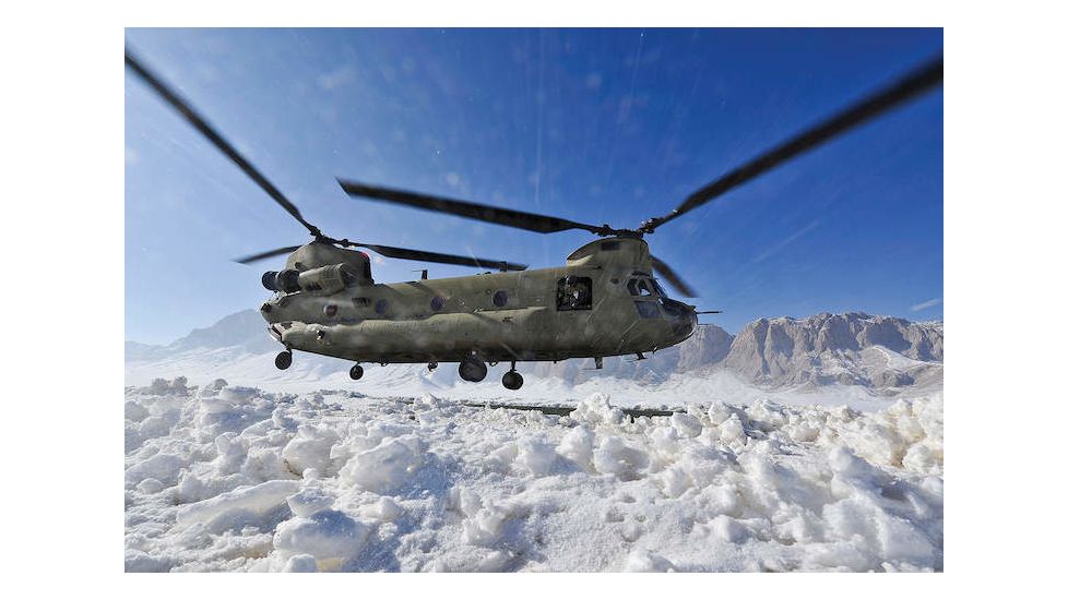 iCanvas Snow Flies Up As A US Army CH-47 Chinook Helicopter Prepares by Stocktrek Images Canvas Print, Multi, 18x12 TRK909-1PC3-18x12