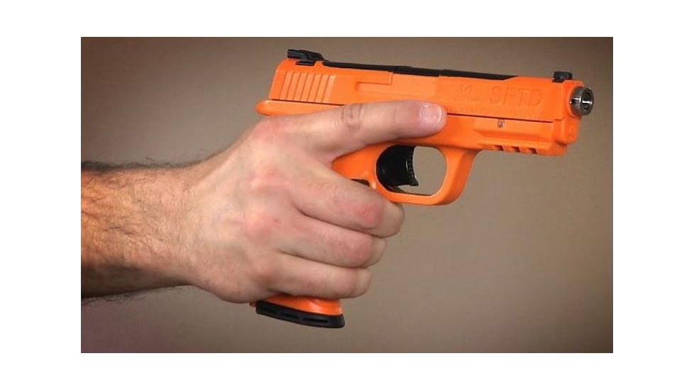 A laser training pistol looks and feels like a real duty gun. 
