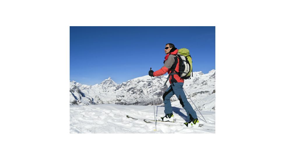 skiing with backpack