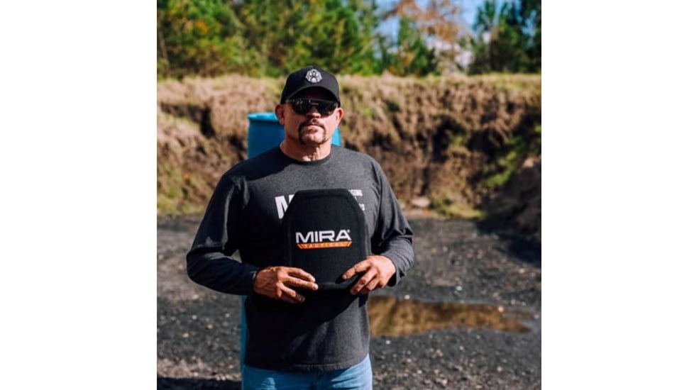 The Iceman holding up an armor plate in the area it's supposed to protect. 