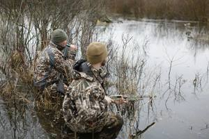 Two People Duck Hunting Together